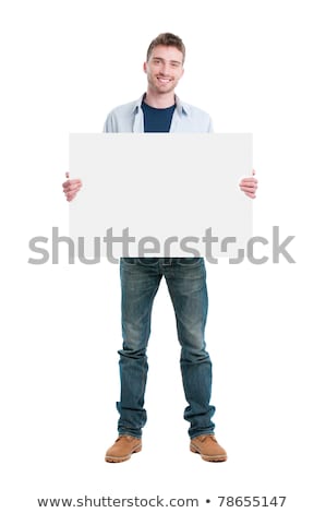 Stock photo: Young Man Holding A Blank Board