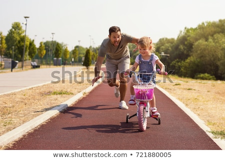 [[stock_photo]]: Father And Daughter Bike Ride