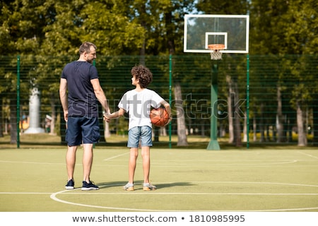 Stock fotó: Family Portrait With Hoop In Field