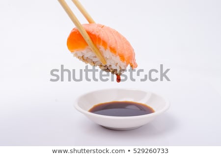 Stockfoto: Sushi Dipped In Soy Sauce
