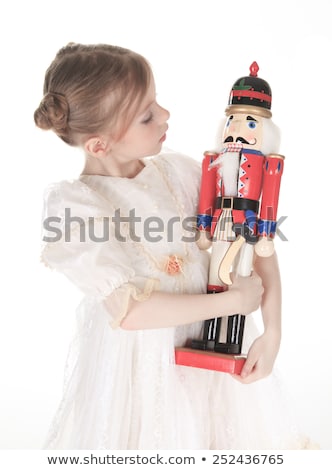 Stock photo: Ballerina Who Holding A Nutcracker
