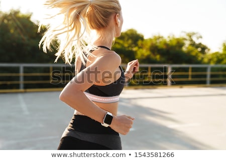 Foto d'archivio: Blonde Woman Exercising