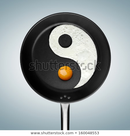 Stock fotó: Yin Yang Eggs In A Frying Pan