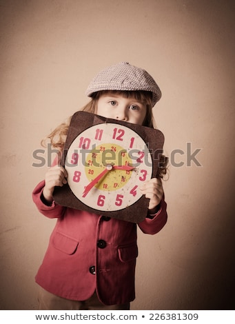 [[stock_photo]]: Sepia Portrait Of A Girl With A Clock