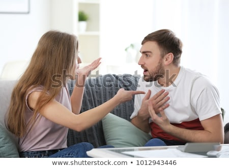 Stockfoto: Young Couple Arguing