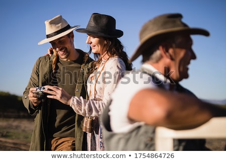 Foto stock: Friends Enjoying In Vehicle During Safari Vacation