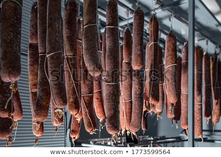 Salami Hanging In The Warehouse Stock fotó © grafvision