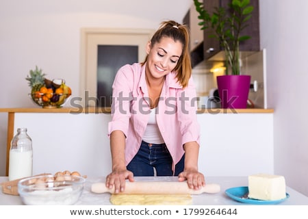 Сток-фото: Woman Holding Rolling Pin