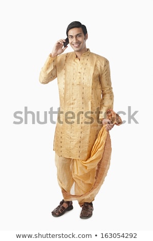 [[stock_photo]]: Bengali Man Talking On A Mobile Phone