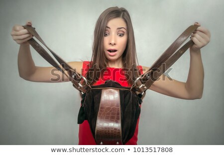 Zdjęcia stock: Shocked Woman Looking At Her Purse