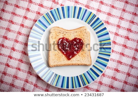 Stock fotó: The Red Heart Shapes From Strawberry Jam