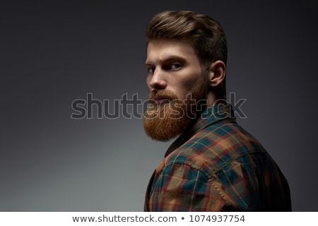 Сток-фото: Portrait Of A Serious Young Bearded Man