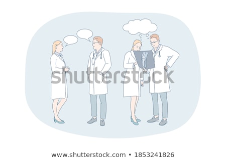 Stock fotó: Young Specialists With Stethoscope Having Discussion