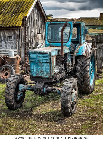 Foto stock: Defective Tractors Standing In The Yard