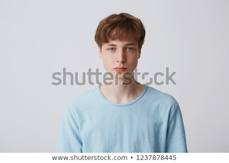 Foto stock: Calm Young Boy Looking At Camera