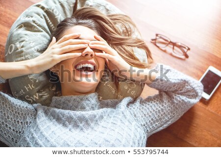 [[stock_photo]]: Beauty Brunette Laying On A Floor