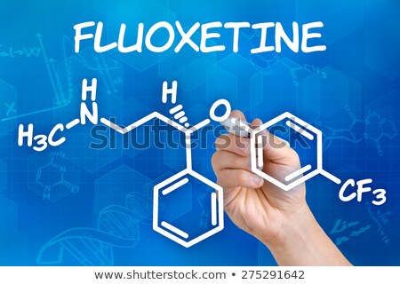 ストックフォト: Hand With Pen Drawing The Chemical Formula Of Fluoxetine