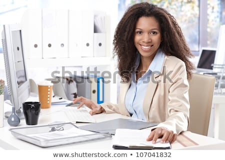 Stockfoto: Woman Office Worker Typing On The Keyboard