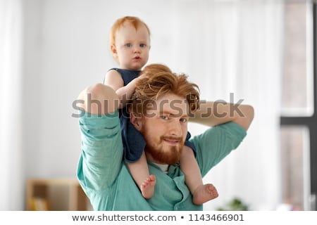 Stock photo: Father Carrying His Little Baby Daughter On Neck