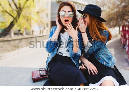 Stock photo: Teenage Girls Gossiping Or Sharing Secrets