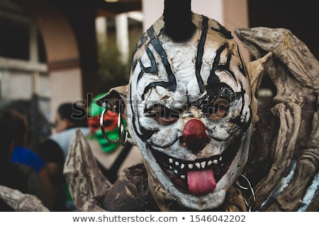 Stock photo: Scary Evil Clown Sticking Out His Tongue