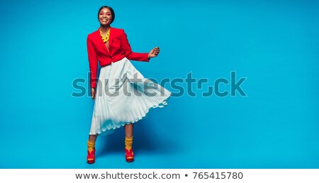 Zdjęcia stock: Woman In Funky Blue Dress Smiling