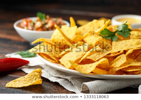 Foto stock: Crisp Corn Nachos With Guacamole Sauce