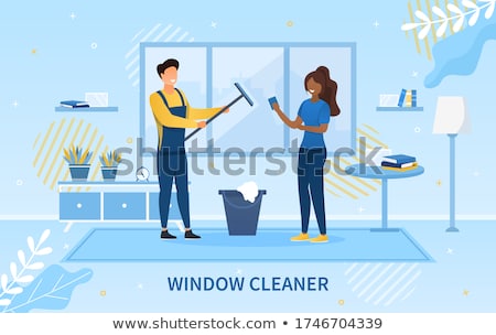 Foto stock: Black Window Cleaner With Squeegee