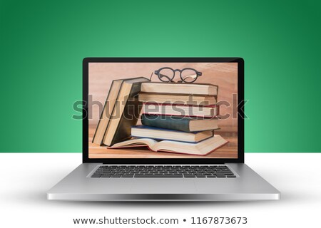 Stock photo: Laptop With With Screen Against Spectacles On Table