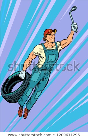 Foto stock: Man Mechanic Tire Flying Superhero Help