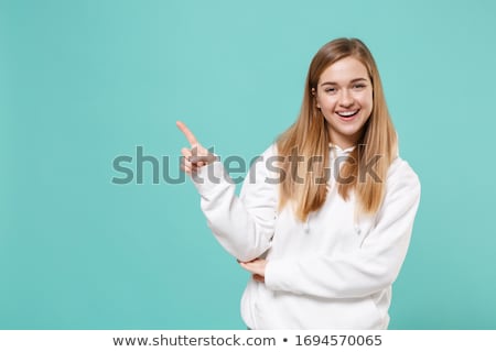 Stockfoto: Stylish Young Woman Pointing And Looking Up