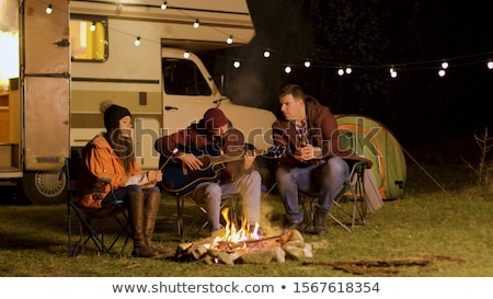 [[stock_photo]]: Retro Camper Van In A Field