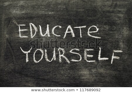 Stockfoto: Educate Yourself Handwritten On Chalkboard