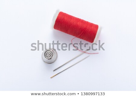 [[stock_photo]]: Silver Thimble And Needles