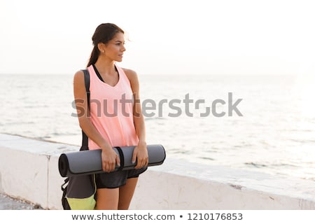 Zdjęcia stock: Smiling Young Sportswoman Standing Outdoors