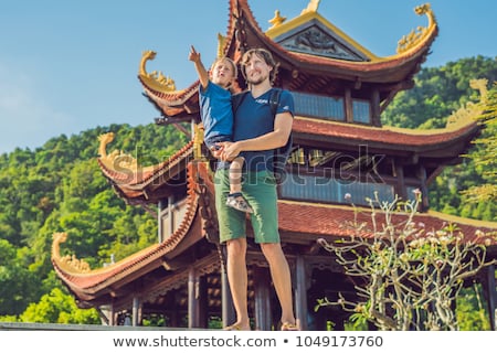 Foto d'archivio: Boy Tourist In Pagoda Travel To Asia Concept Traveling With A Baby Concept