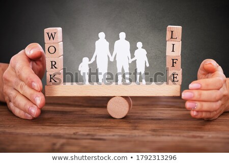 Stok fotoğraf: Human Hand Protecting Equality Word On Wooden Blocks