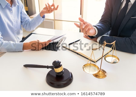 Stock fotó: Legal Counsel Presents To The Client Negotiating A Contract Seri