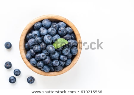 Stok fotoğraf: Blueberry In Bowl On Blue Background