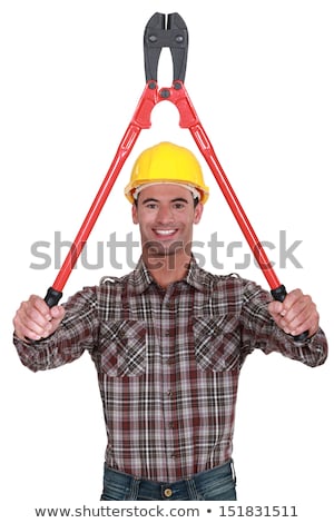 Foto d'archivio: Craftsman Holding A Huge Spanner