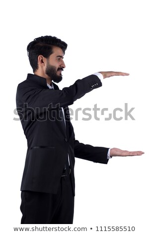 Stock fotó: Man Standing Down Pointing To His Side