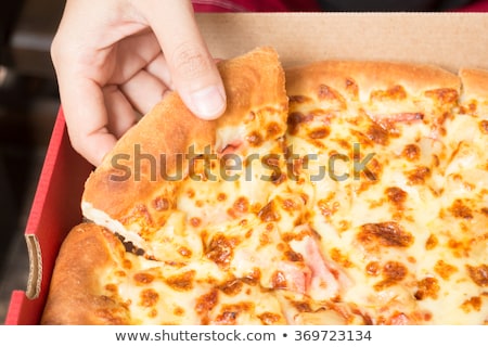 Hand On Extra Cheese Pizza Pan Stock foto © nalinratphi