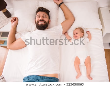 Foto stock: Happy Father With Little Baby Girl At Home