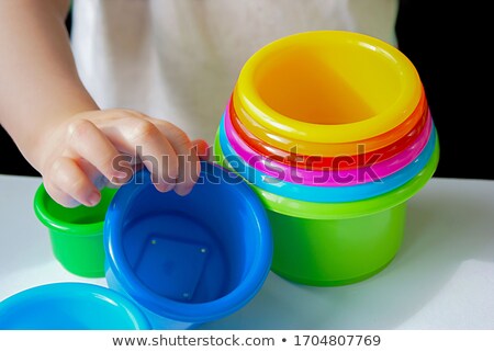 Сток-фото: Pyramid Of Colorful Plastic Bowls