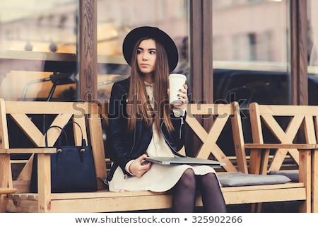 [[stock_photo]]: Gorgeous Young Brunette Outdoors With Her Book