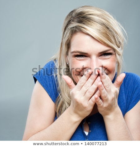 Foto stock: Isolated Timid Smiling Woman