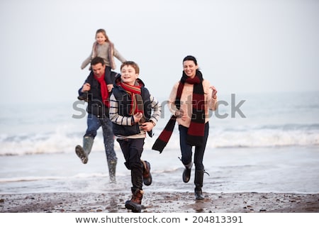 Stock photo: Mother And Children On Winter Beach