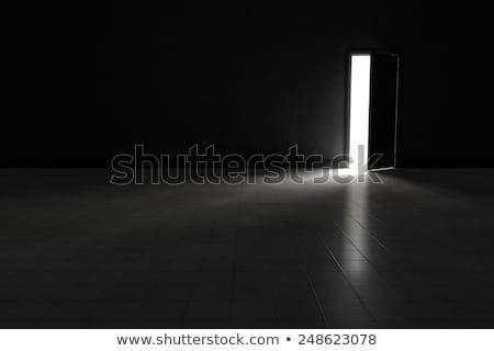 Foto stock: Very Dark Room With Door