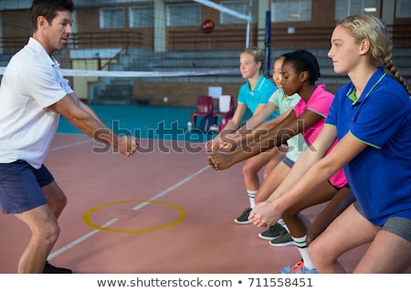 Stock foto: Volleyball Coach Talking To Female Players