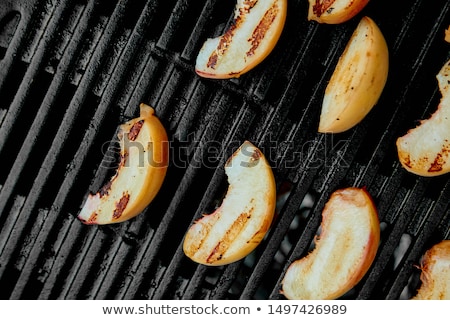 Stok fotoğraf: Grilled Peach On Black Gas Grill Grilled Dessert